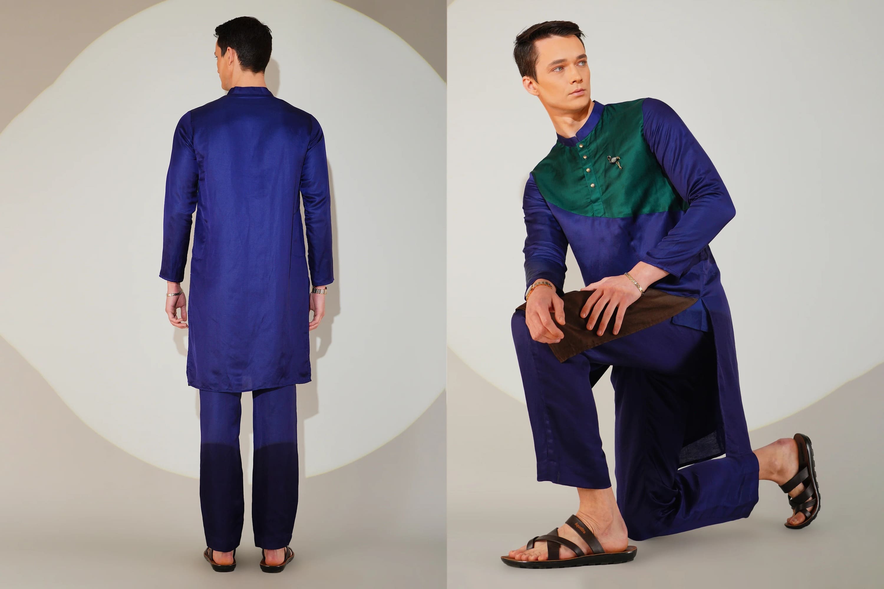 Man modeling a traditional outfit with a blue kurta and green vest on a neutral background