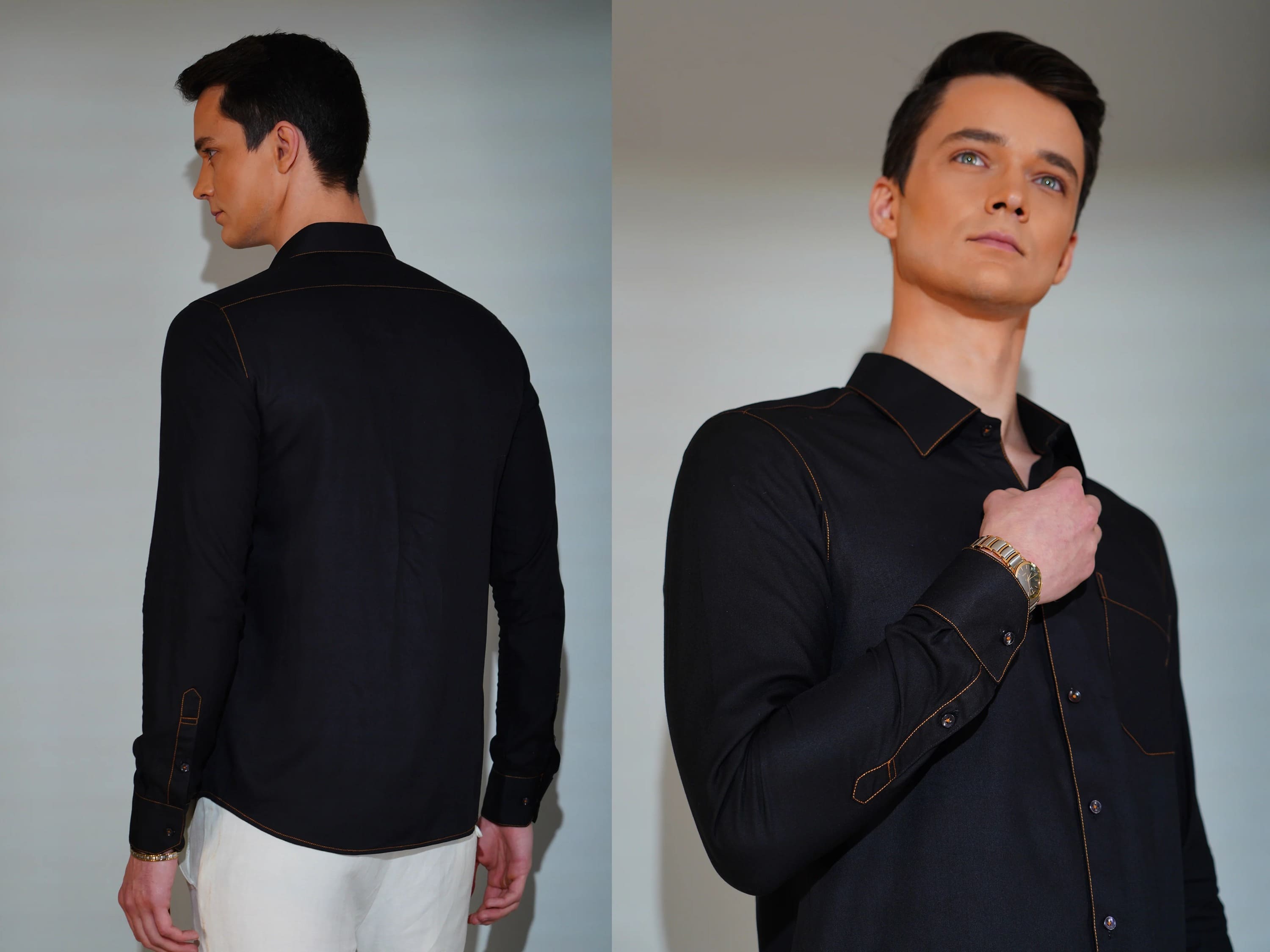 Man wearing a black jacket with a plain background