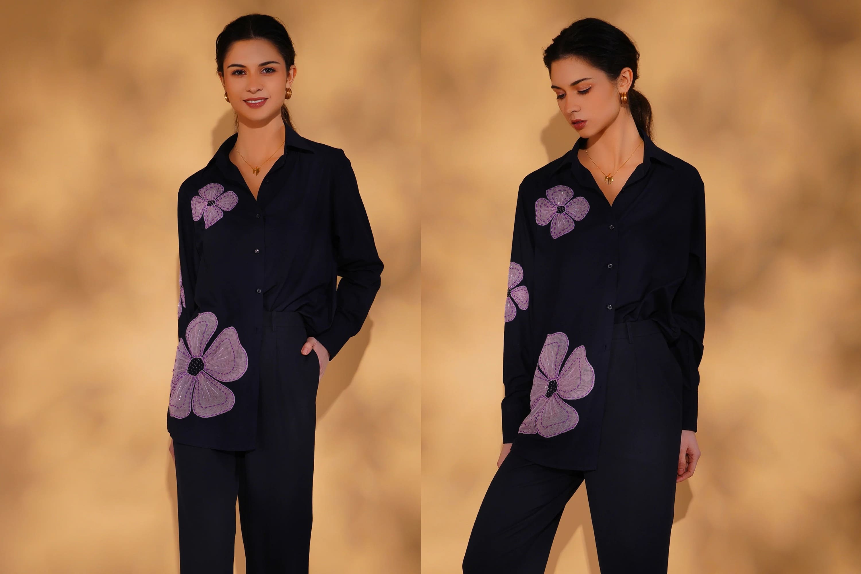 Woman wearing a dark outfit with purple floral patterns on a beige background