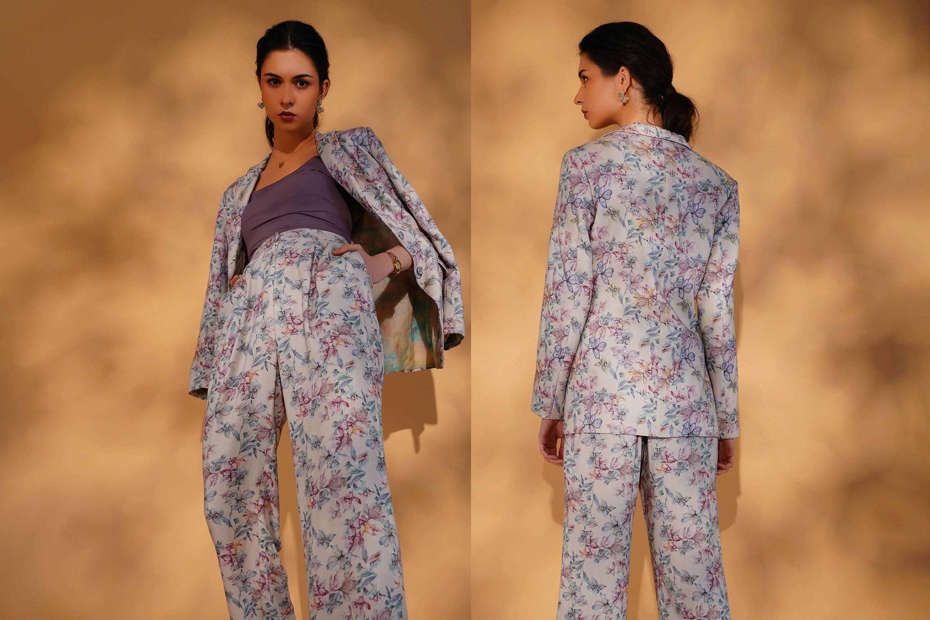 Woman wearing a floral suit with a blurred background