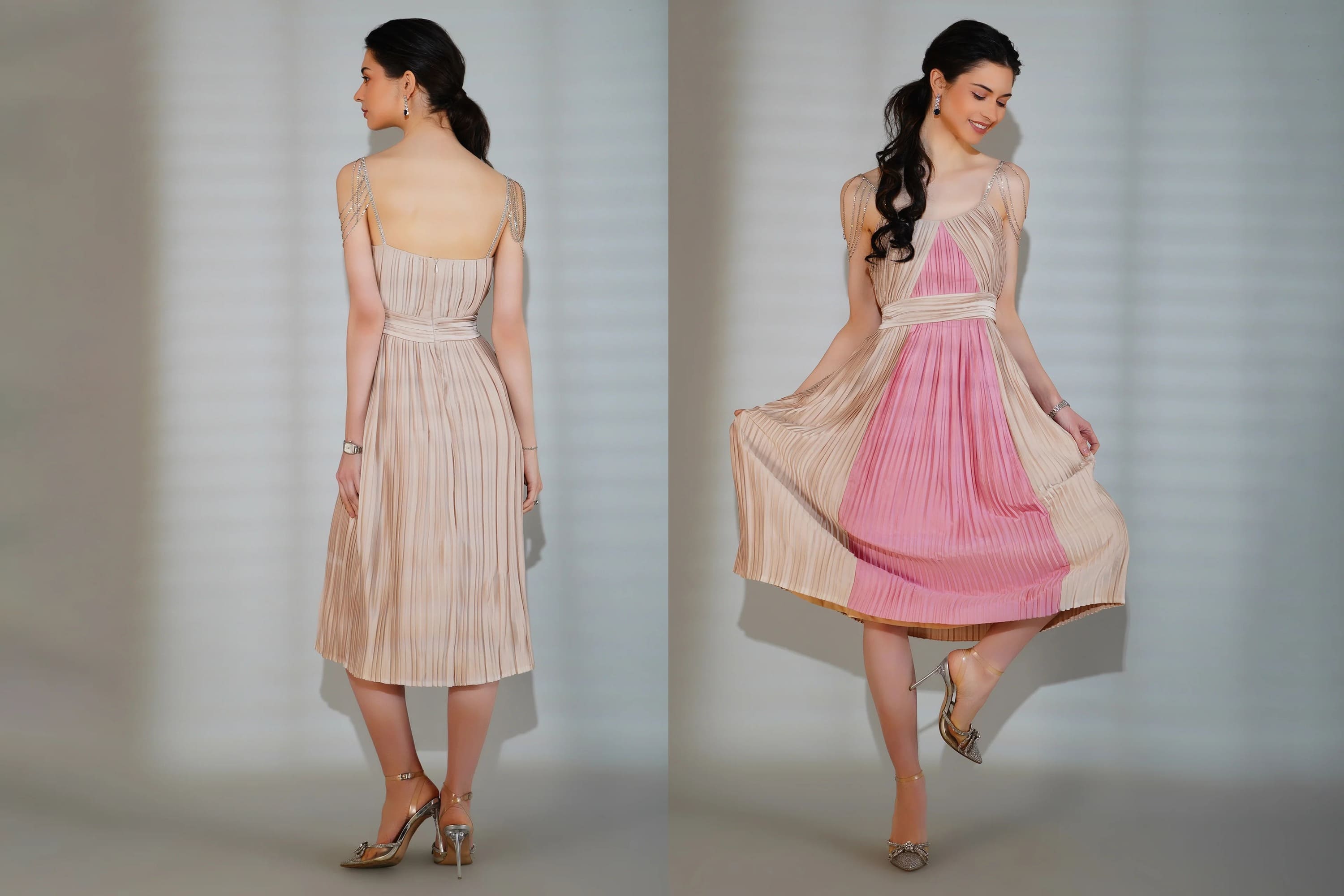 Woman modeling a two-tone dress with beige and pink colors on a plain background