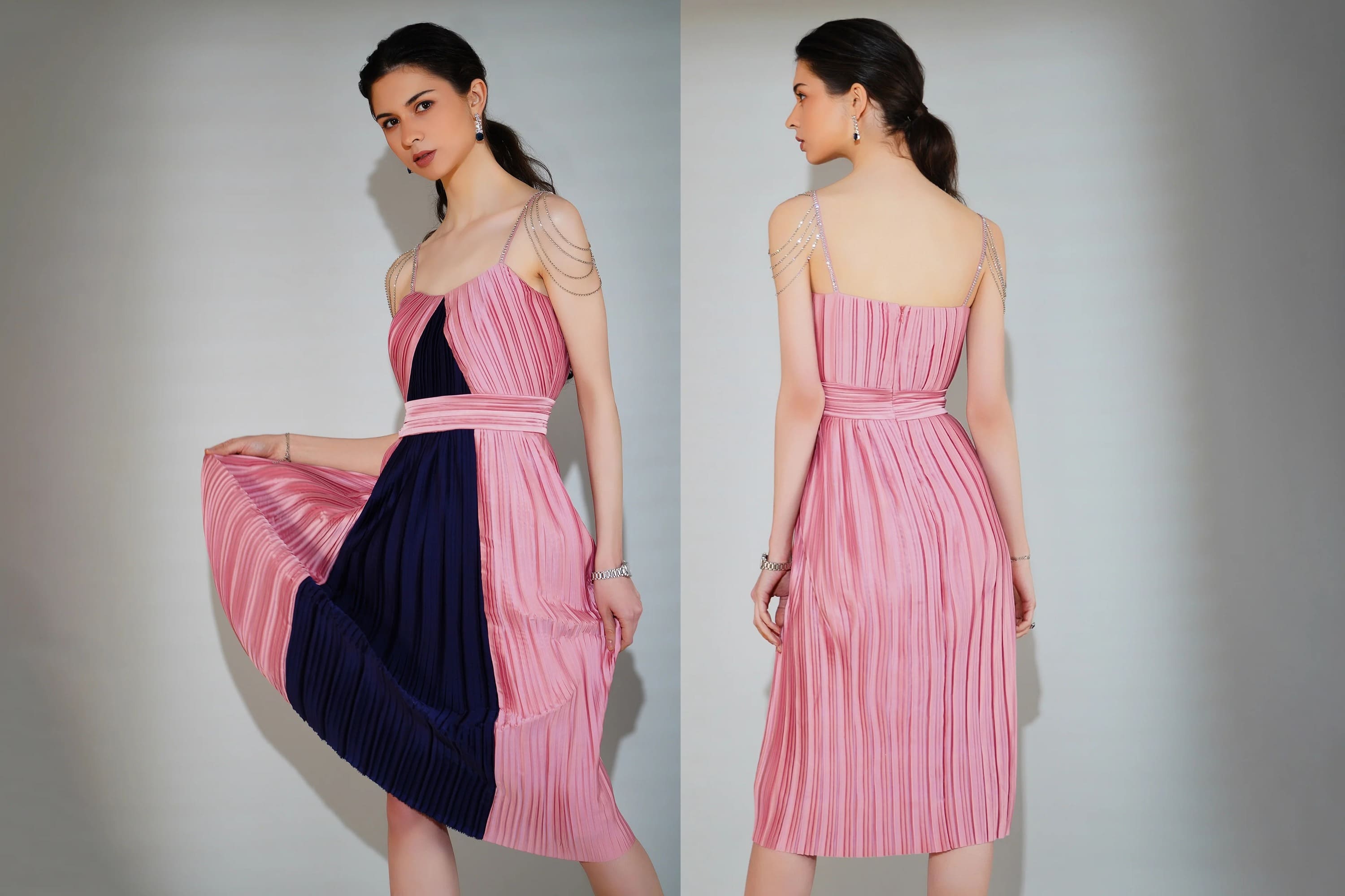 Woman modeling a pink and black dress from front and back views against a neutral background