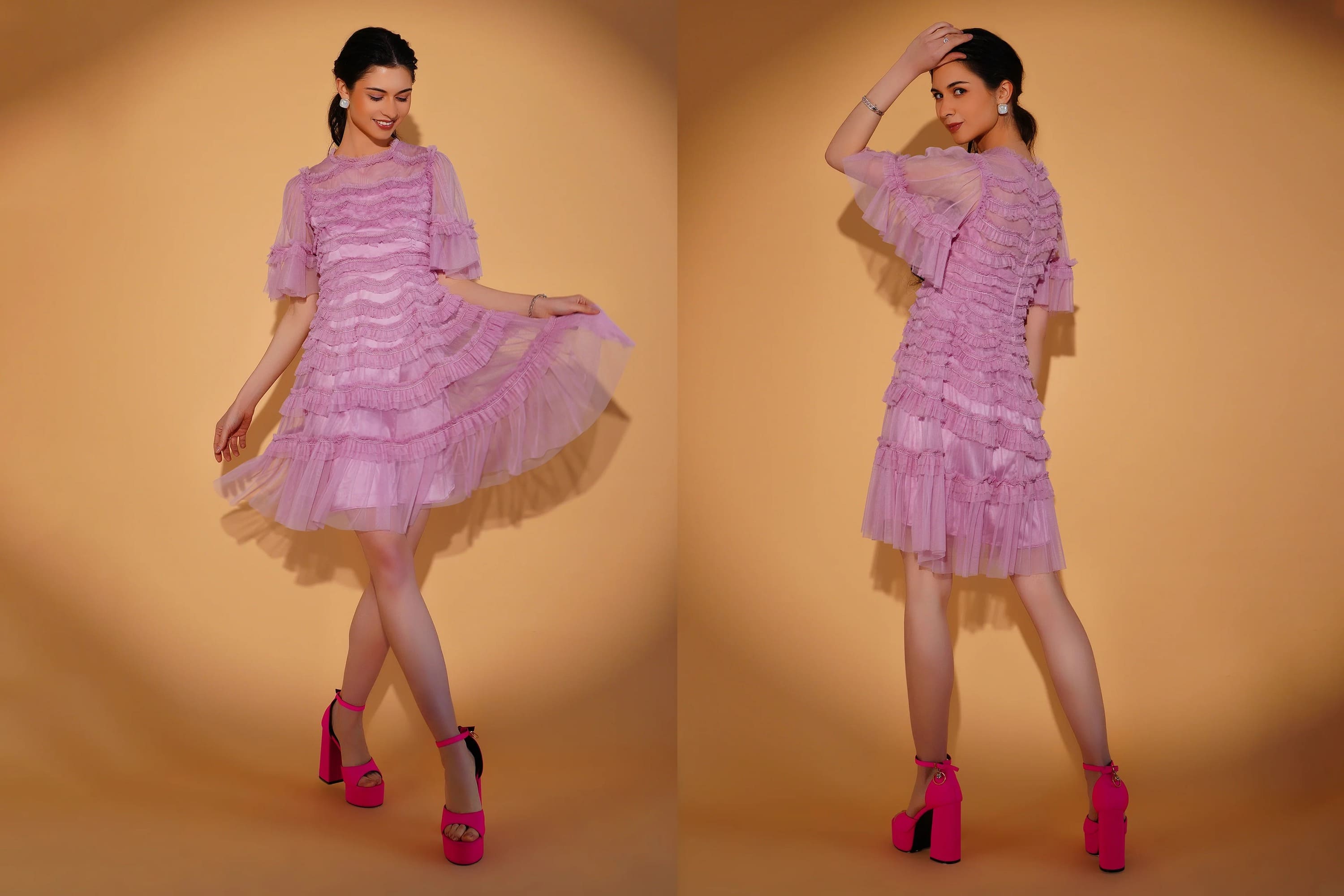 Woman wearing a pink dress with ruffled layers on a beige background